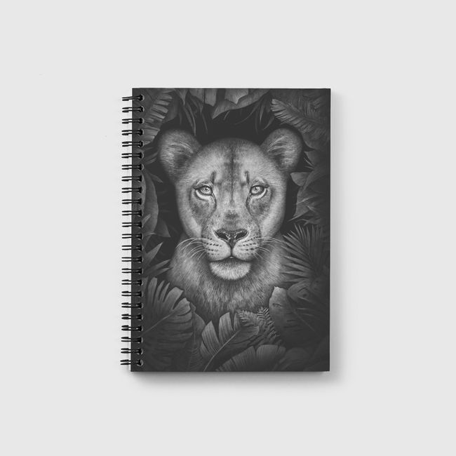 Lioness in tropical leaves - Notebook